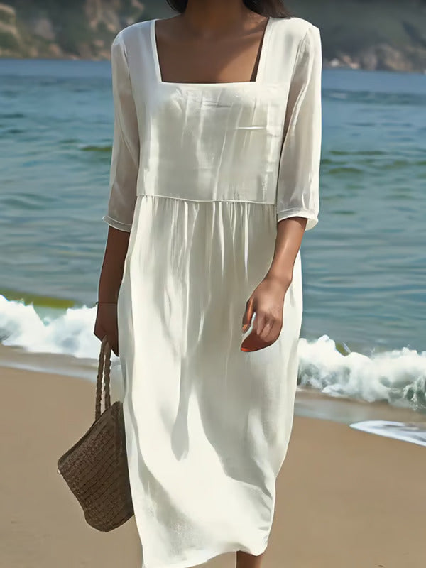 Weisses besticktes Kleid mit leichter Passform